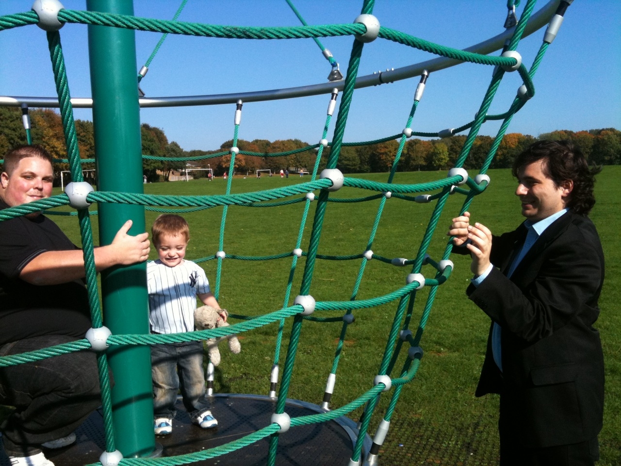 Mike & Cllr Richard Giddings on the new play equipment with  Mike son (Jamie, Age 2)